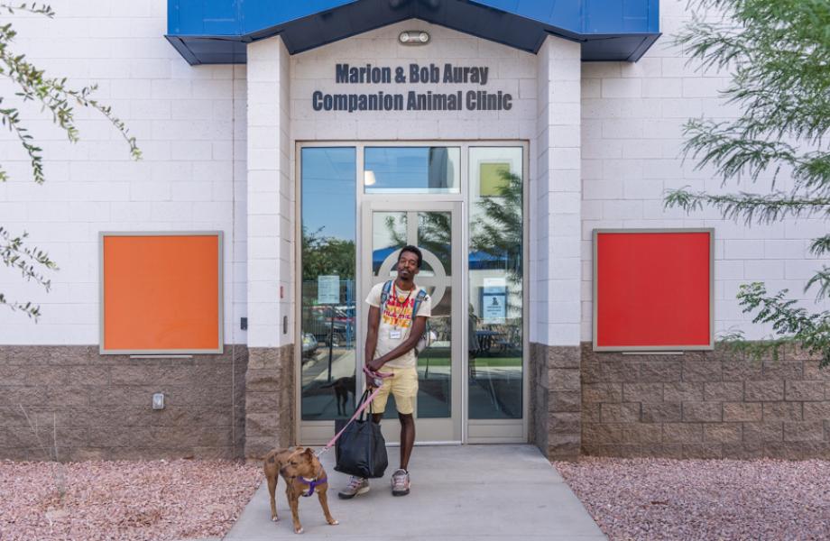 A resident stands in front of the new CAP Clinic.