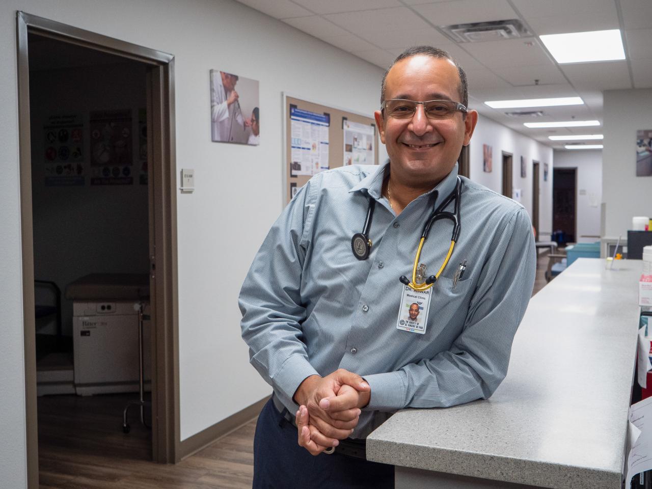 Dr. John Anwar poses in the medical clinic.